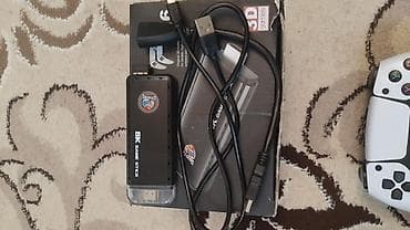 tv set: Gamestick X6 TV oyun seti Məhsulun tərkibi: - 2 ədəd simsiz gamepad — 4