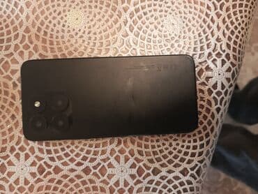 телефон fly ezzy 2: Smartfon – qara rəng - Ekran: ön tərəfdə damla tipli (waterdrop) ön — 1