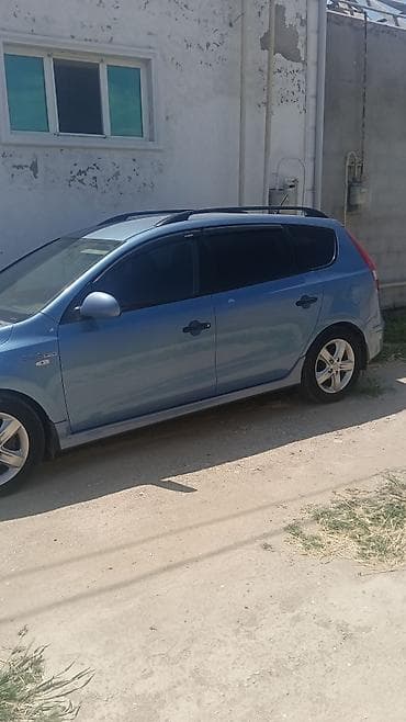 kia optima 2 sade mator: Hyundai i30 CW (universal) – mavi rəngli, Blue Drive nişanlı — 1