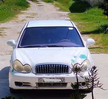 nissan 2 7: Hyundai Sonata: 2 l | 2003 il Sedan — 1
