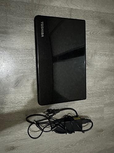 dell notebook: Toshiba noutbuk + orijinal adapter Xüsusiyyətlər və dizayn: - Qara — 2