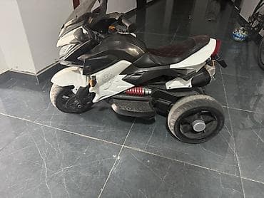 Uşaq elektrik üçtəkərli motosiklet - Dizayn: Skuter tipli kuzov, ön — 1