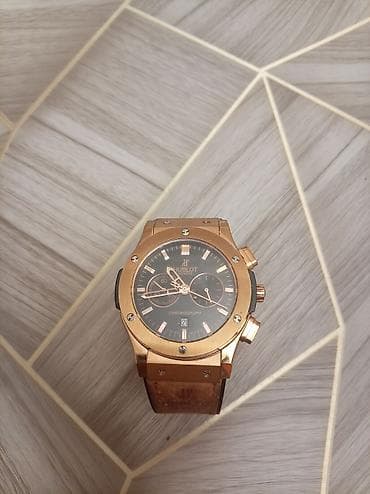 qol: İşlənmiş, Qol saatı, Hublot, rəng - Qızılı — 1