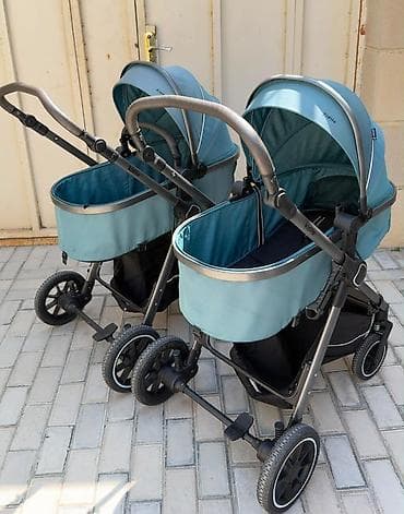 Uşaq dünyası: Milana Kidilo kaleska 2 ededdi ekizler ucun alinib 1 ededi 100man cox — 1