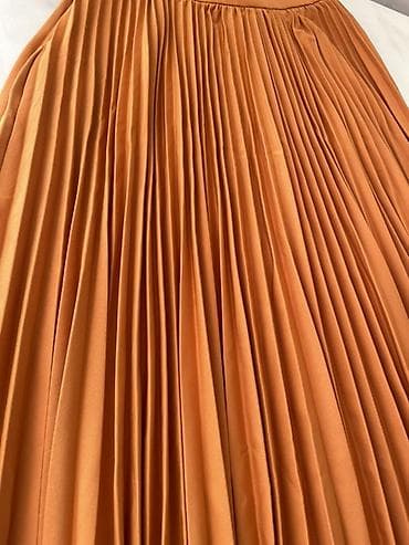 qelem etekler: Zəfəran rəngində pliseli ətək 100 azn alib - Model: yüksək belli, tam — 2