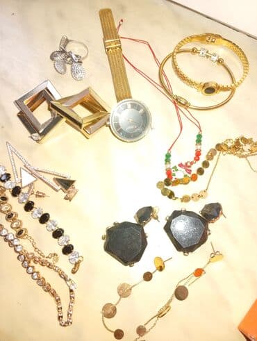 xari bulbul sancaq: Müxtəlif aksessuar dəsti – dəbli zərgərlik və saat Tərkib: - Qızılı — 1