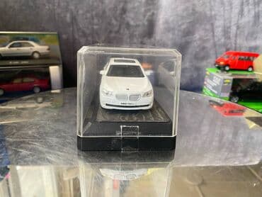 metbex tavan modelleri: Коллекционная модель BMW 750i F02 white 2008 RASTAR Scale 1:43 Art — 6