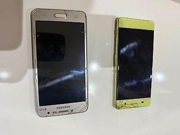 reqemsal kamera: İki ədəd mobil telefon dəsti. 1) Samsung DUOS (ağ/gözəl qızılı arxa — 2
