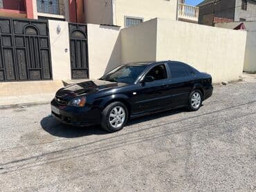 Чехлы: Chevrolet Evanda: 2 л | 2005 г. 300000 км Седан — 5