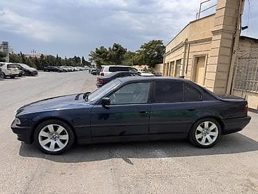 tesla model s: BMW 7 series: 3.5 l | 1996 il Sedan — 2