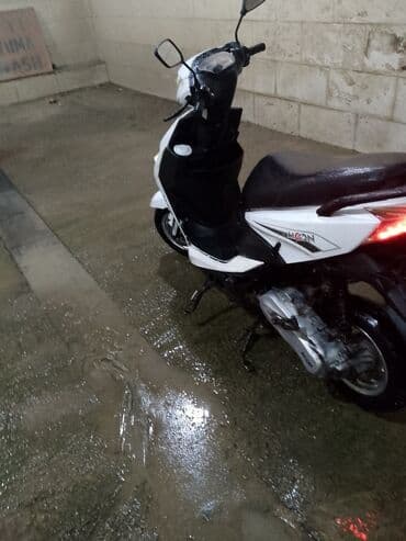 купить мопед бу: Şəhər içi üçün yığcam və çevik skuter. Xüsusiyyətlər: - Kuzov rəngi — 5