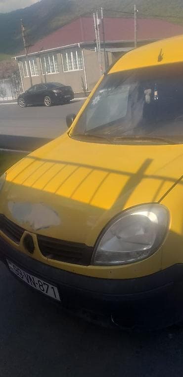masin qaz: Renault Kangoo sarı rəngli yük/furqon avtomobili. Xüsusiyyətlər: - — 5