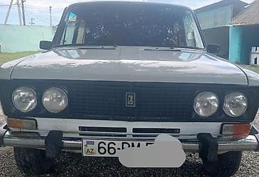 Model: Lada VAZ 2106 (klassik “şeşorka”) Kuzov: sedan, ağ rəng Sükan