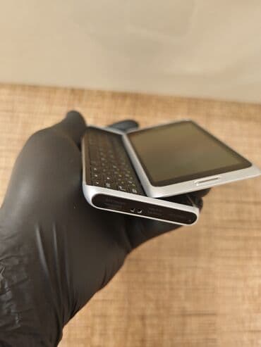 nokia 2720 fold: Nokia E7, 16 GB, rəng - Gümüşü, Sensor — 10