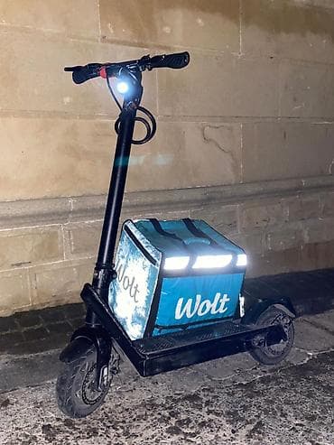 sur: Elektrik skuter + Wolt termobağlaması Məhsulun təsviri: - Şəhər içi — 2