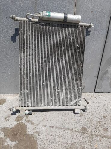 radiator barmaqliq: Nissan Tida üçün su və kondisioner radyatorları var başqa ehtiyat — 2