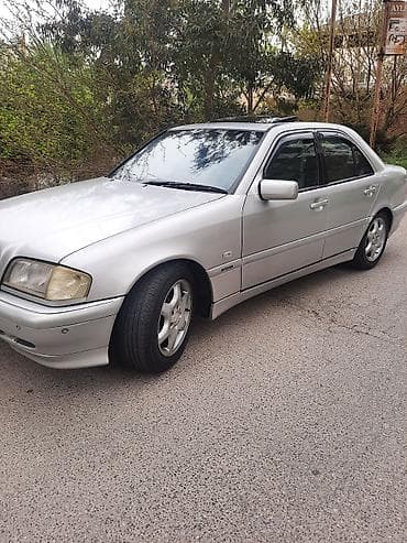 mersedes amg: Mercedes-Benz C240, sedan, gümüşü rəng. - Ban növü: 4 qapılı sedan — 10