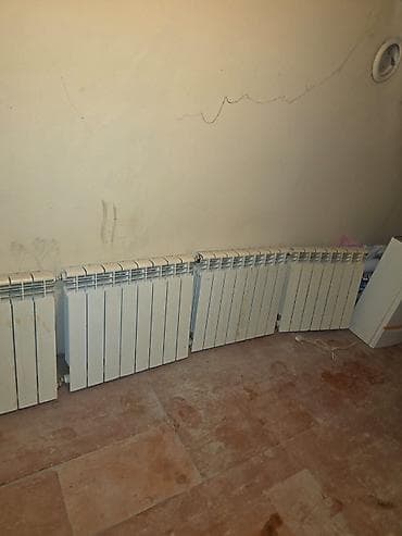 Сантехнические работы: Kombi və radiatorlar 24lük kombi və radiatorlar.üstdən çıxma — 2
