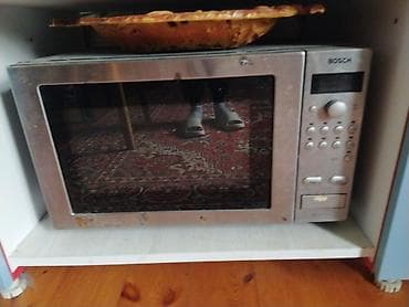 islemis soyuducu: Mikrodalğalı soba Bosch, Ayrıca dayanan, Mikrodalğalar ilə, rəng - Gümüşü, İşlənmiş — 1