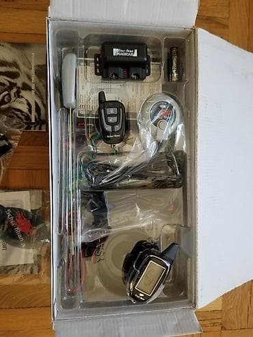 Видеоигры и приставки: Авто сигнализация в упаковке.два пульта абсолютно защена от угона со — 6