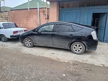 daewoo gentra 2019: Toyota Prius (2-ci nəsil) hibrid hetçbek - Kuzov: 5 qapılı hetçbek — 1