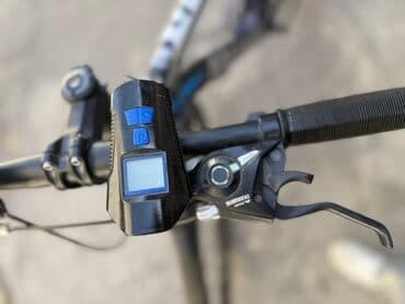 asma mühərrikli velosiped nədir: 29 olculu Merach dağ velosipedi, qara rəngdə və mavi detallarla — 3