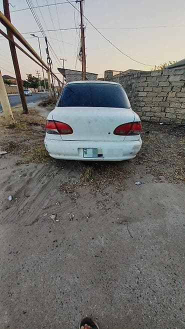 bmw e46 lip: Kia Avella: 1.3 l | 1997 il Hetçbek — 5