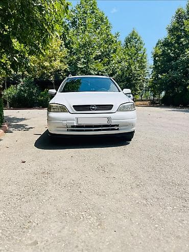 бампера гольф 2: Opel Astra: 1.8 л | Универсал — 3