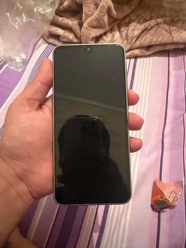 Smartfon – 6.6” yaxın böyük ekranlı, damla formalı ön kamera çıxıntısı