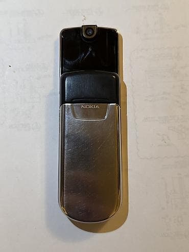Техника и электроника: Nokia 1, цвет - Серебристый, Кнопочный — 2
