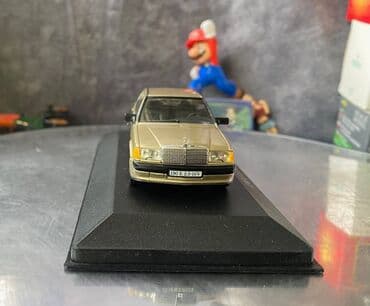 metbex tavan modelleri: Коллекционная модель Mercedes-Benz 190E 2.3 16V W201 gold 1984 EDICOLA — 5