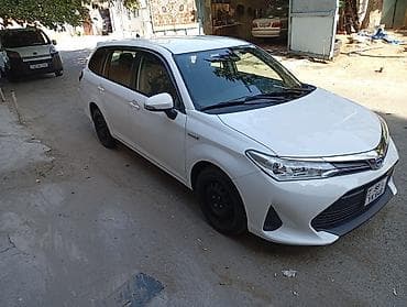 corolla cros: Toyota Corolla Fielder Hybrid, ağ rəng, universaI kuzov. Texniki — 5