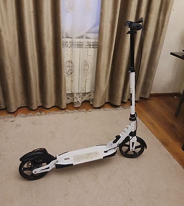 Самокаты: Şəhərdaxili hərəkət üçün böyük təkərli skuter - Mexaniki — 2