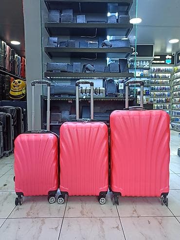 qaci: Qırmızı/çəhrayı rəngdə 3-lü sərnişin çamadan dəsti - Ölçülər: kiçik — 1