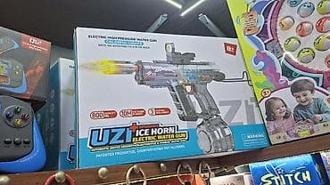 oyuncak tapanca: ● Bu, "Uzi Ice Horn" modeli olan elektrikli su tapançasıdır ● Tapança — 8