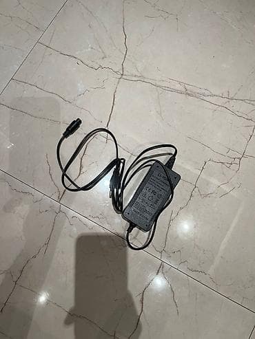 Elektrik nəqliyyatı: İdeal veziyyetde, adapteri var, 1-2 gun zaretka saxlayir, yuk — 5