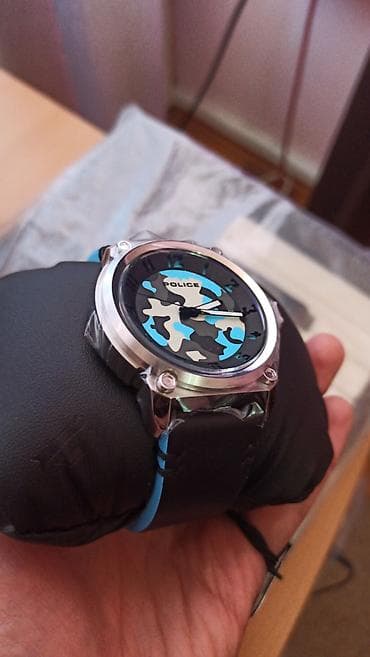 Zərgərlik əşyaları: POLICE, 164$ saat, tezedir, batareya tukenib. Boyuk el ucun razmer — 1
