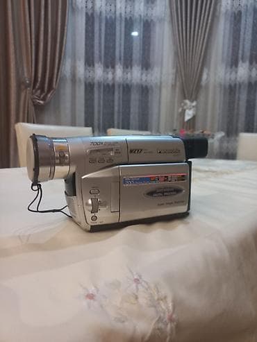 foto aparat type 1: Panasonic video kamera, evdə istifadə üçün idealdır. Yüngül və — 2