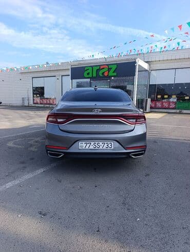 qadınlar ucun maşınlar: Hyundai Grandeur sedan - Korpus: Boz rəng, dinamik və axıcı sedan — 12