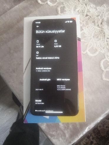 Мобильные телефоны и аксессуары: Xiaomi Mi 9 Lite, цвет - Белый, 
 Отпечаток пальца — 2