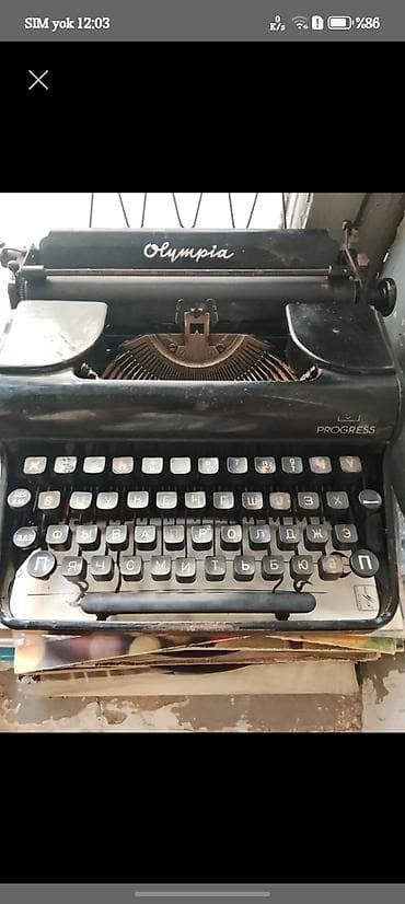 Olympia Progress mexaniki yazı maşını - Brend/model: Olympia Progress