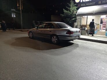 06 sekileri: Opel Omega: 2 l | 1994 il 200000 km Sedan — 6
