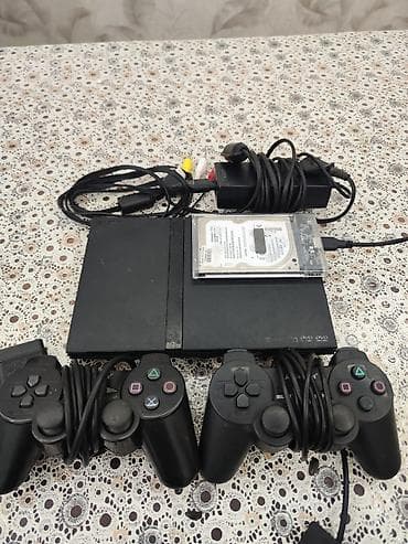 Видеоигры и приставки: Salam PlayStation 2 satılır normal vəziyyətdə di içində hardisk ilə — 1