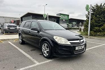 opel astra 2017: Opel Astra H Caravan (universal) – qara rəngdə, 5 qapılı şəhər və ailə — 8