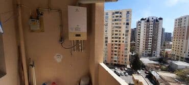 köhnə suraxanıda kirayə evlər: Nerimanov Rayonu, su sonasi ilə üzbə-üz bravonun arxasi.15 mərtəbəli — 10