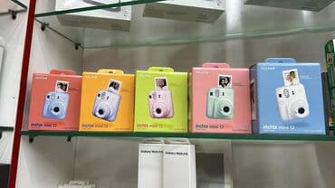 mini: Fujifilm instax mini 12 green blue white 199m Fujifilm instax mini 12 — 1