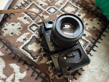 mini fotoaparat qiymetleri: Zenit TTL markalı qara rəngdə kamera. Bu kamera əl ilə fokuslanma və — 2