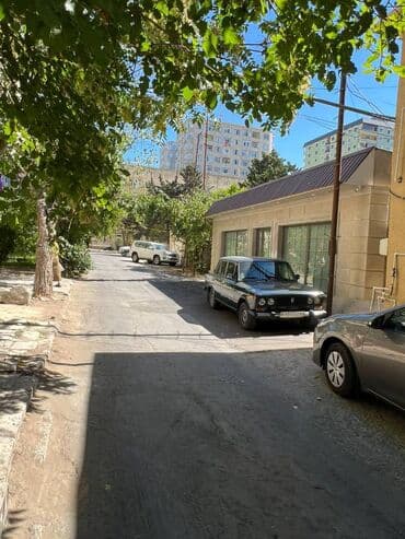 аренда торгового места в магазине: Badamdarda yerləşən 100 kv sahəsi olan təmirli əşyalı 2otağlı — 12