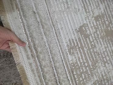 Bej-krem rəng palitrasında müasir naxışlı xalça Dunən 120 manata