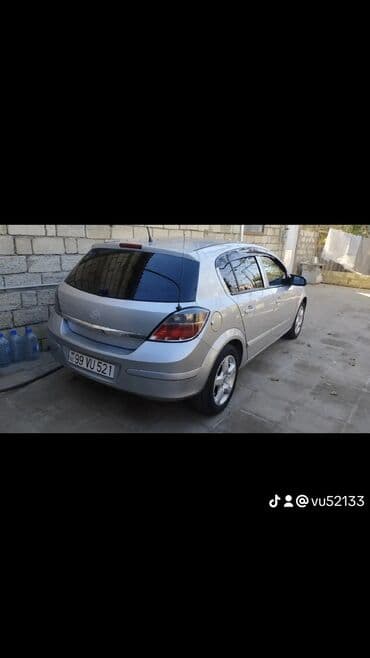 daewoo gentra necə maşındır: Opel Astra H – 5 qapılı hetçbek, gümüşü rəng. - Nömrə: 99 VU 521 - — 5
